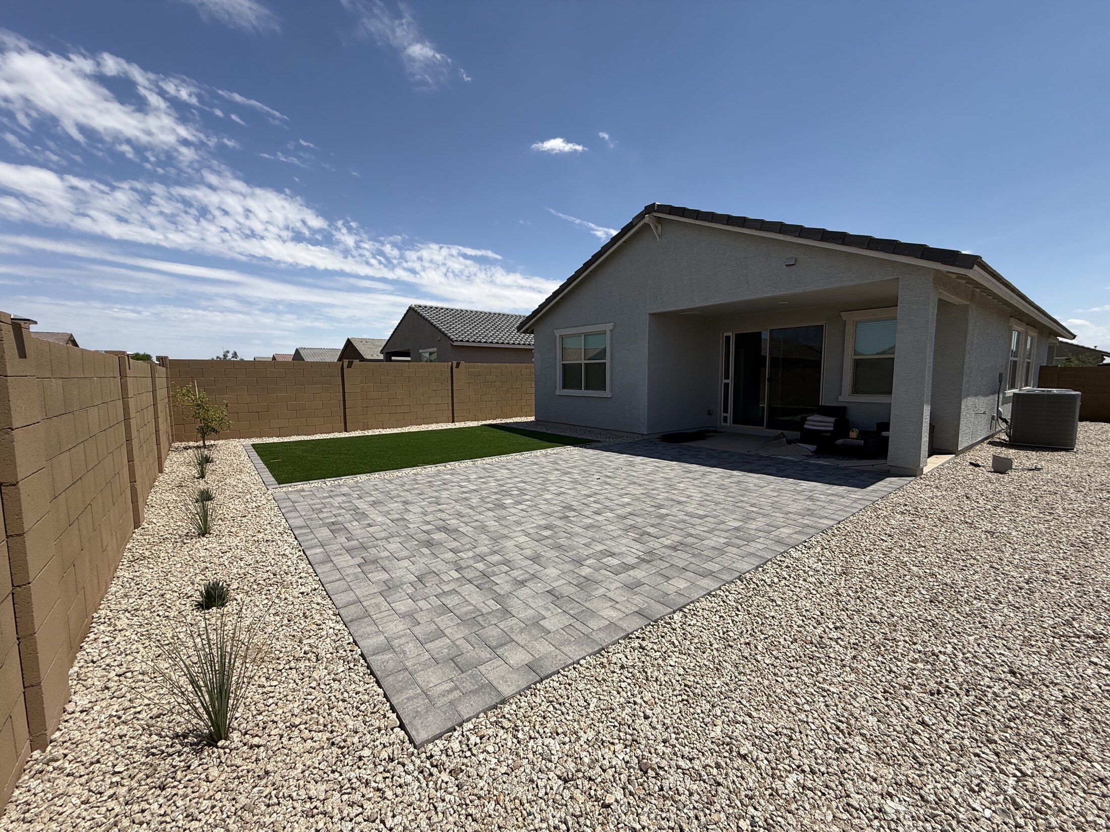 Simple paver patio in a low-maintenance yard